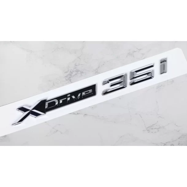  - logo & Emblems - Emblème BMW XDrive 35i - 1 - Améliorez votre BMW avec notre emblème XDrive 35i pour un look sportif et authe