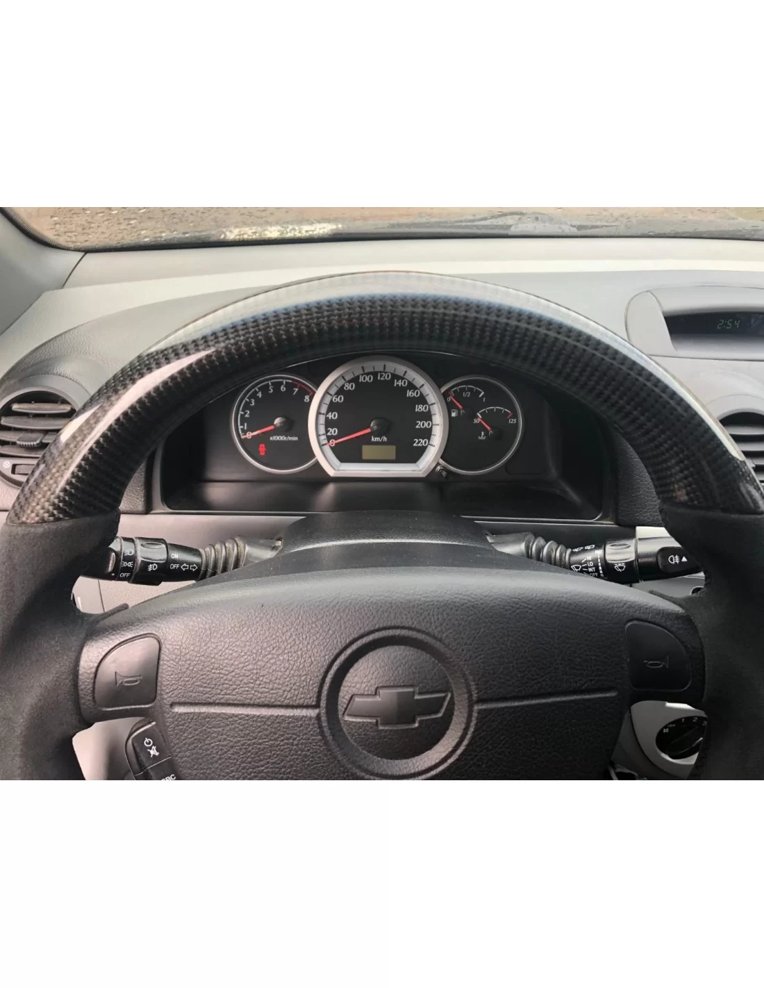 - Volant - Chevrolet Lacetti 2006 Volant Carbone Alcantara - 5 - Améliorez votre Chevrolet Lacetti 2006 avec notre Volant Alcan - Volant - Chevrolet Lacetti 2006 Volant Carbone Alcantara - 5 - Améliorez votre Chevrolet Lacetti 2006 avec notre Volant Alcan