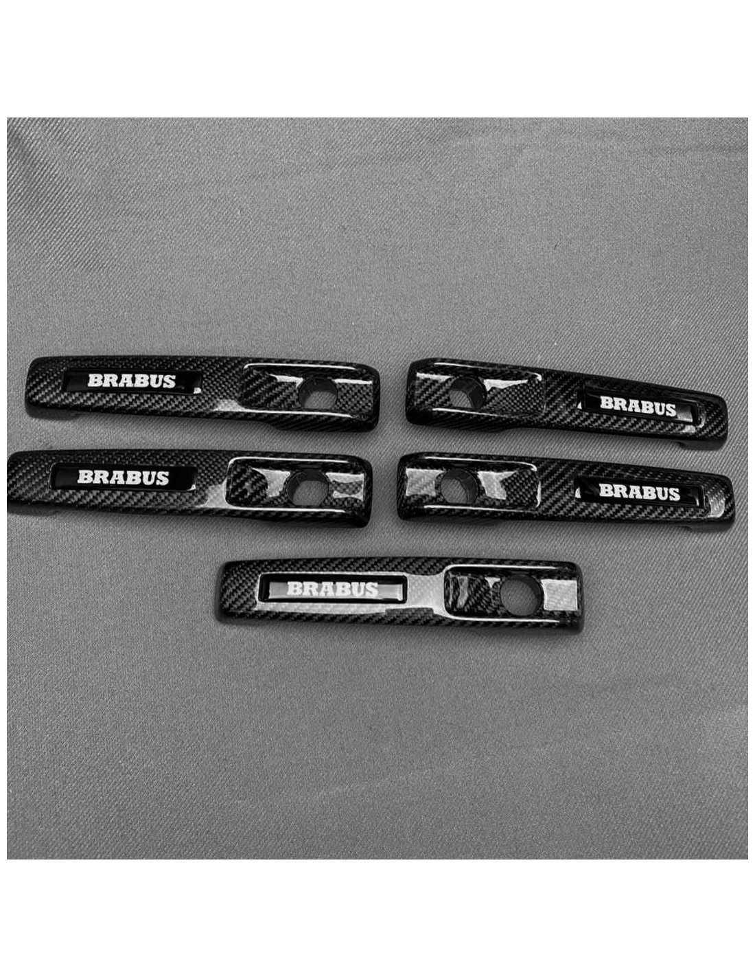 - Mercedes Benz - Poignées de porte Brabus en fibre de carbone 5pcs pour Mercedes-Benz W463 G-Class - 1 - Améliorez votre Merce - Mercedes Benz - Poignées de porte Brabus en fibre de carbone 5pcs pour Mercedes-Benz W463 G-Class - 1 - Améliorez votre Merce