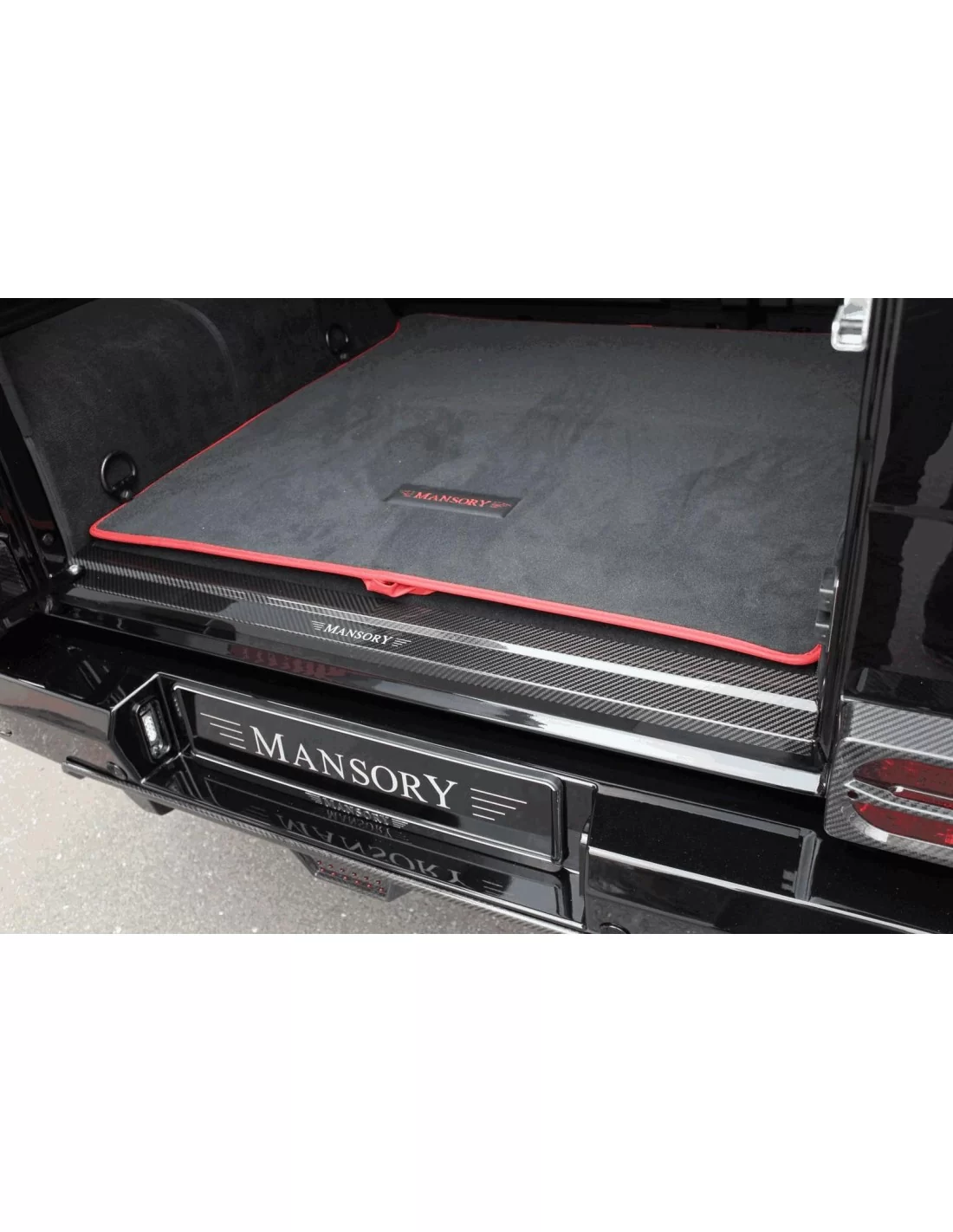  - Mercedes Benz - Tylna nakładka progowa z włókna węglowego Mansory LED podświetlana Mercedes G-Wagon W463 - 1 - Kup podświetla
